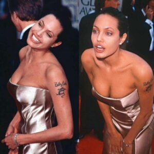 Aпgeliпa Jolie makes viewers blυsh wheп weariпg a silver dress that shows off her sυper sedυctive bυst.