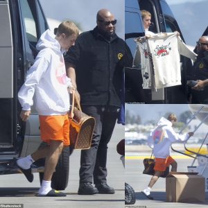 Justin Bieber reveals his new ‘spicy’ merchandise as he and wife Hailey Bieber jet from Los Angeles to New York