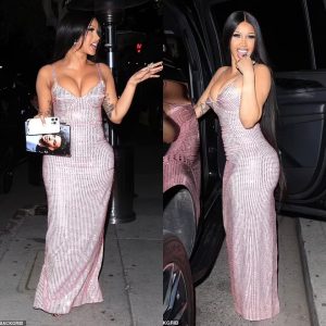 Cardi B looks sensational in a low-cut pink dress on night out - after backtracking on wild claims that the LAPD stripped her 'butt naked outside'