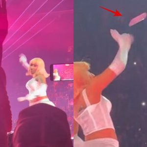 OMG; Nicki Minaj hurls object back into audience after it nearly hits her in the face during Detroit