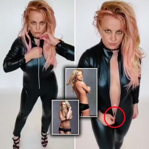 Britney unzipped! Spears dares to bare as she pulls down skintight leotard to her nave